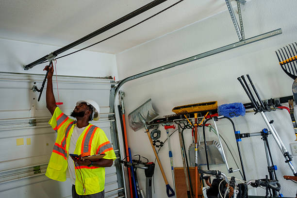 Professional Garage Door Panel Replacement technician working in Glens Falls North, NY